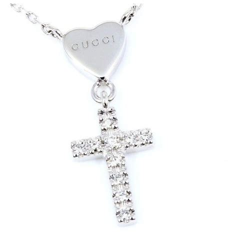 gucci white gold heart and diamondcross pendant